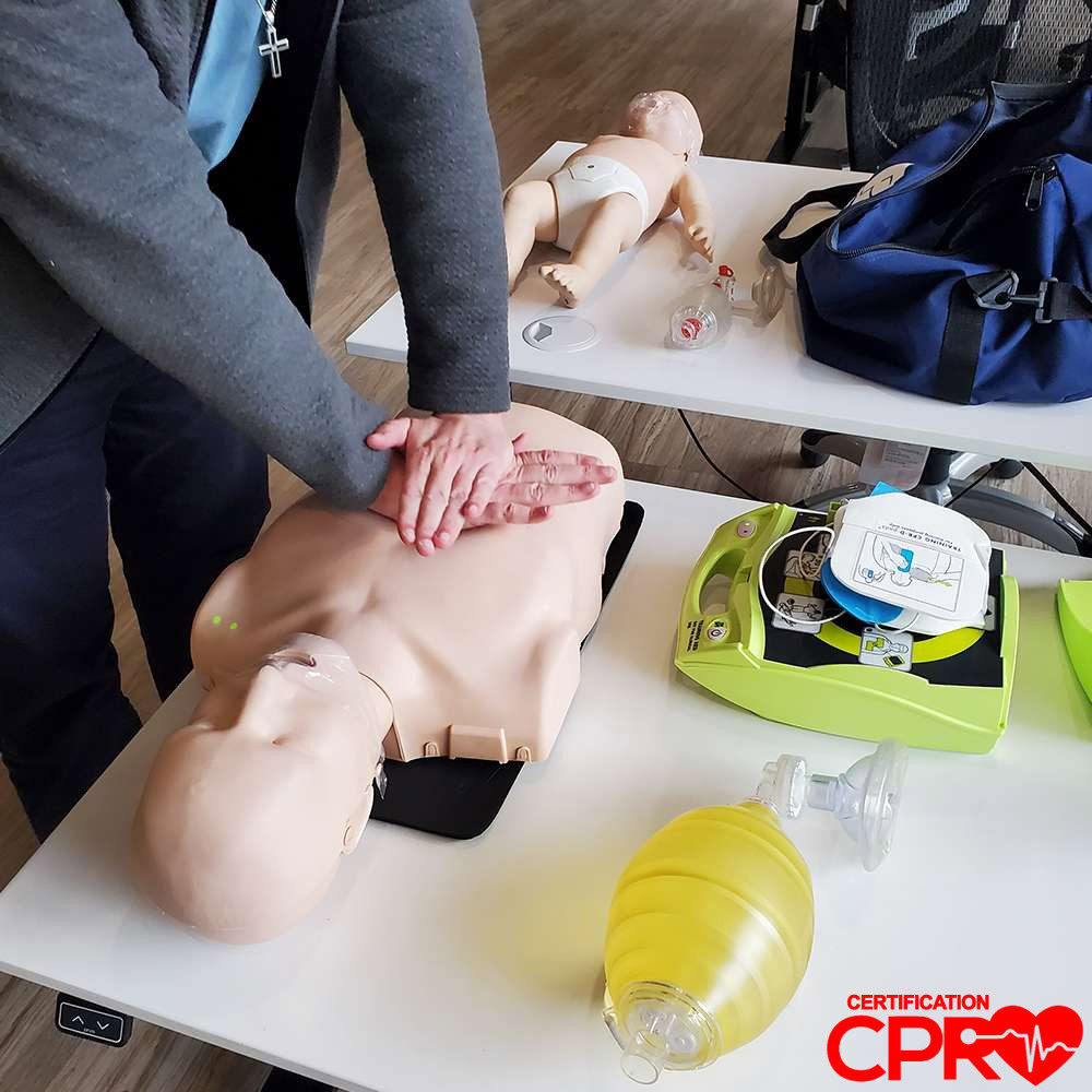 CPR training on mannequin for certification in Las Vegas.