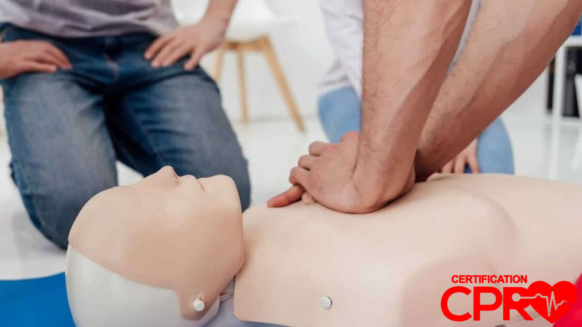 CPR training session with a man practicing on a mannequin in Las Vegas.